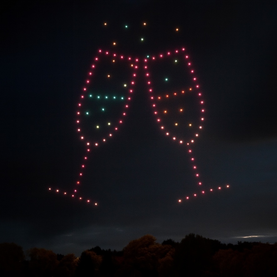 Champagne glasses clink